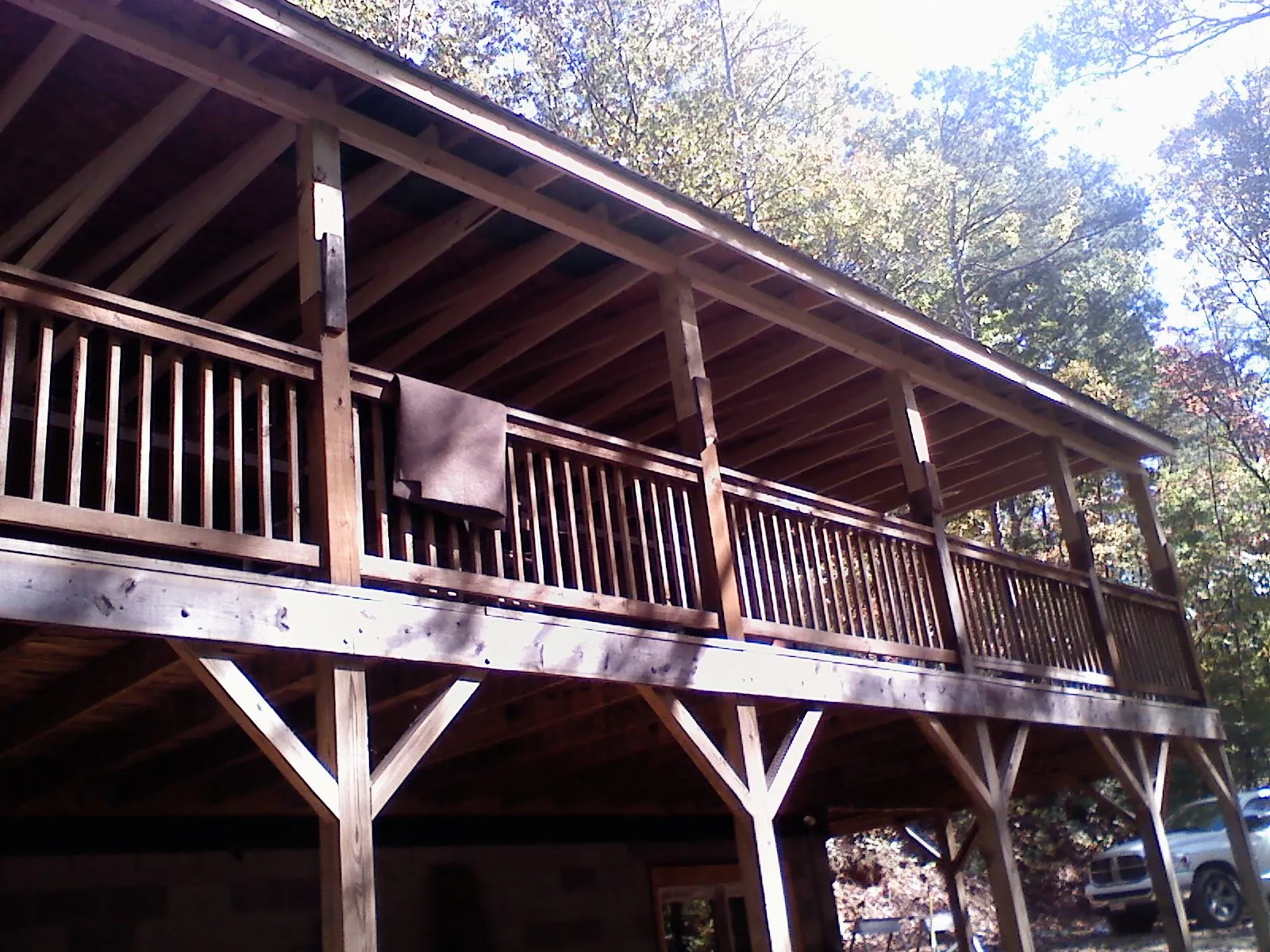 Timber framing under a new elevated porch and deck — Roof Leak Repair in Travis Afb by Roofing Brothers